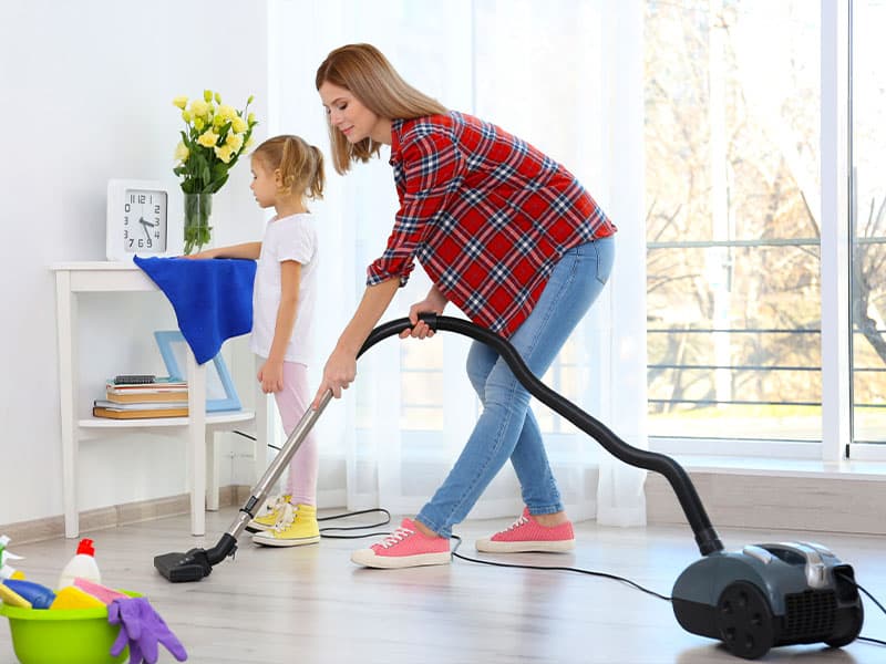 Mother and daughter doing cleanup